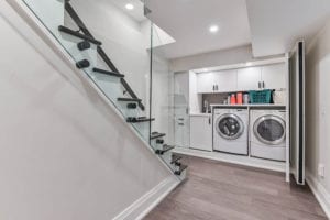 Basement laundry room renovation by Kilbarry Hill Construction